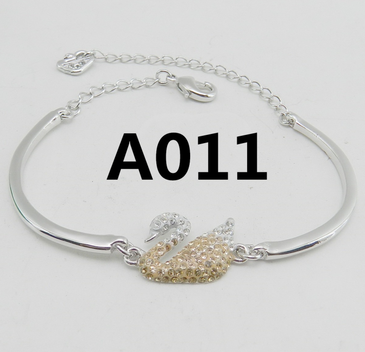 Brazalete Swarovski Swan Cisne Bicolor Champán y Blanco