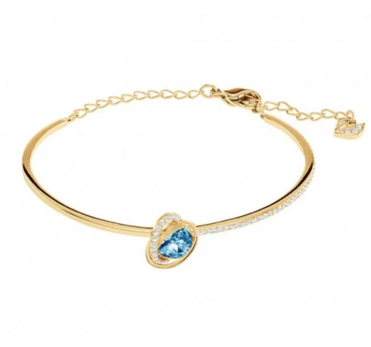 Brazalete dorado cristal celeste forma orgánica