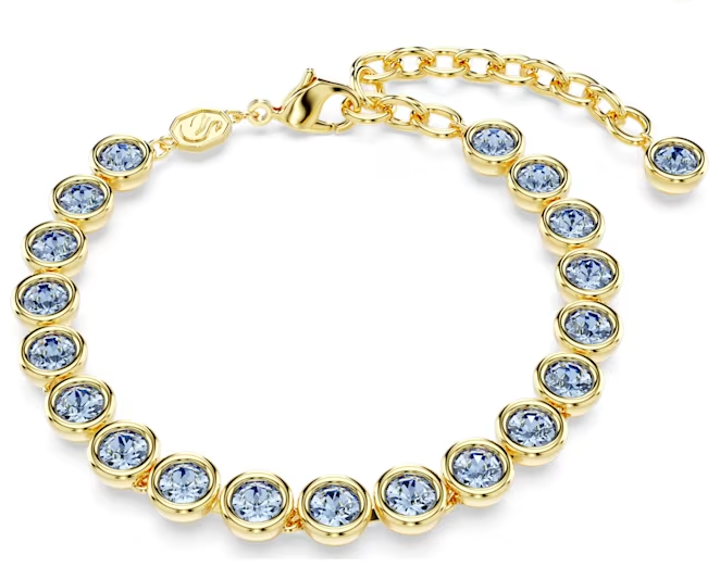 Brazalete Swarovski cristales azul claro en fila tono dorado