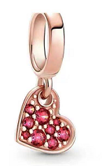 Charm colgante corazón baño oro rosa con circonias rojas dispersas