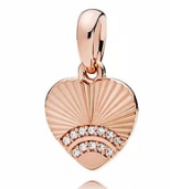 Charm colgante corazón baño oro rosa rayos