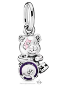 Charm colgante figura animal sobre tambor morado