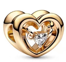 Charm corazón calado dorado con circonia flotante Pandora