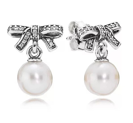 Aretes Pandora lazo pavé y perla colgante